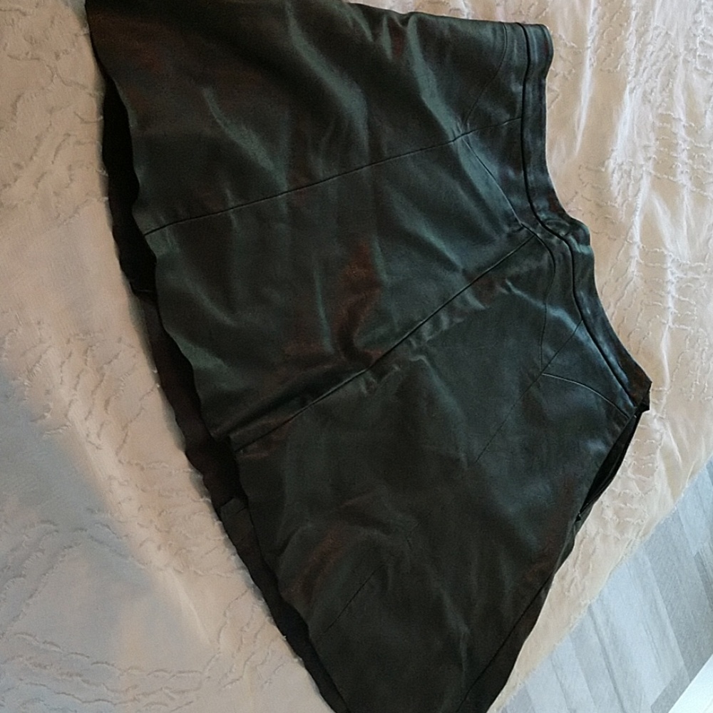 Faux leather flared,fully lined mid-thigh length